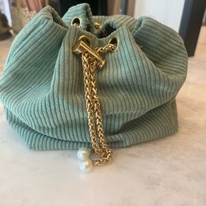 Crossbody bag with pearl hanging pretty seafoam green color